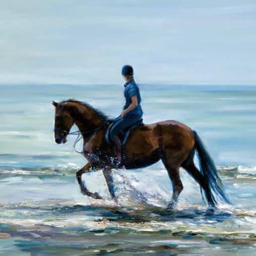 horseback riding on a beachfront calm waters